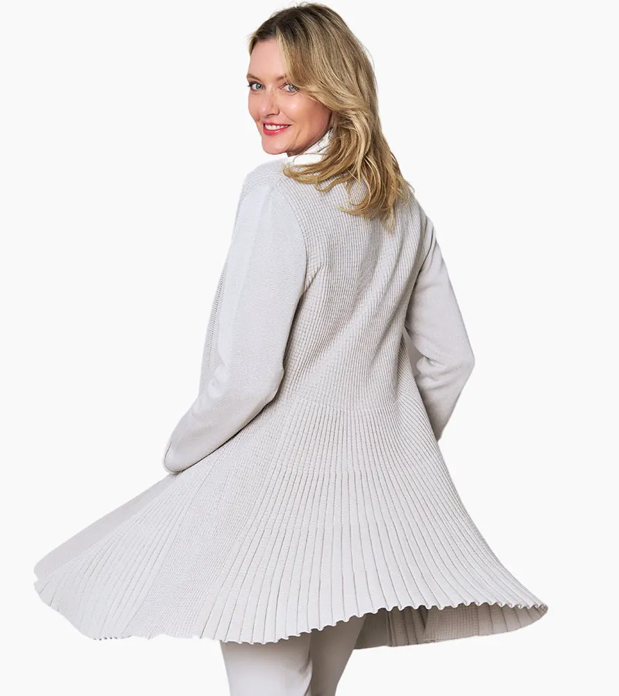 Certainly! To optimize the title of an e-commerce product for a Go To Cardigan, lets incorporate descriptive and appealing modifiers that highlight key features. Heres an enhanced version:

Cozy Womens Go-To Knit Cardigan Sweater - Versatile, Lightweight, Perfect for Layering

This title includes modifiers that emphasize comfort, style, and functionality.