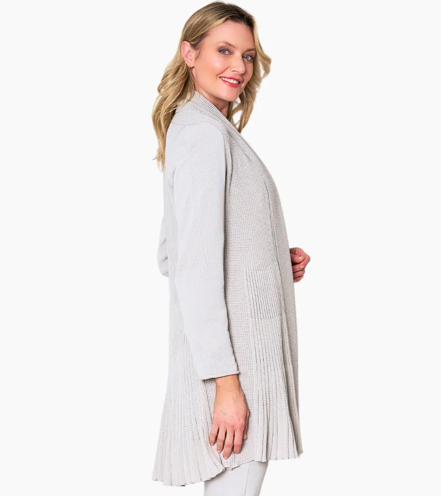 Certainly! To optimize the title of an e-commerce product for a Go To Cardigan, lets incorporate descriptive and appealing modifiers that highlight key features. Heres an enhanced version:

Cozy Womens Go-To Knit Cardigan Sweater - Versatile, Lightweight, Perfect for Layering

This title includes modifiers that emphasize comfort, style, and functionality.