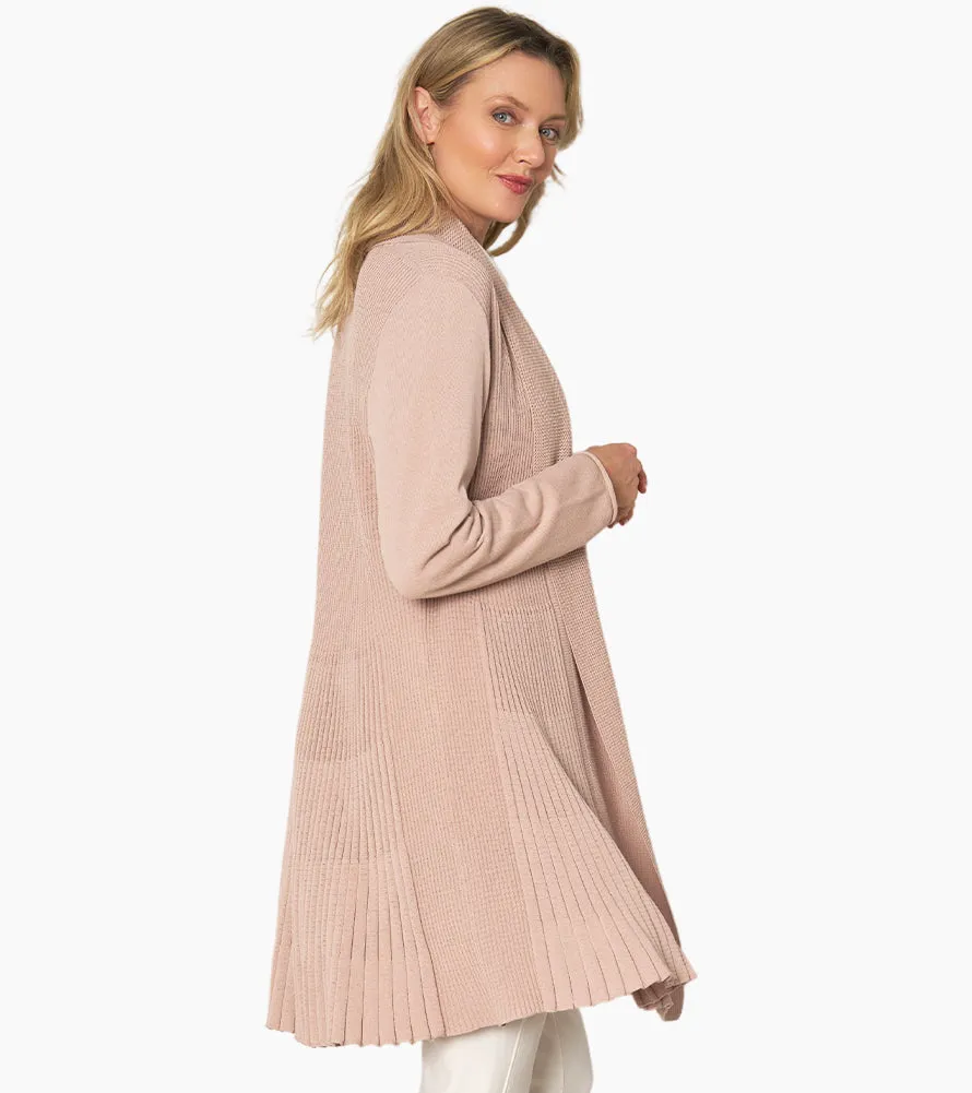 Certainly! To optimize the title of an e-commerce product for a Go To Cardigan, lets incorporate descriptive and appealing modifiers that highlight key features. Heres an enhanced version:

Cozy Womens Go-To Knit Cardigan Sweater - Versatile, Lightweight, Perfect for Layering

This title includes modifiers that emphasize comfort, style, and functionality.